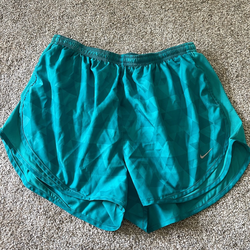 Teal Nike running shorts